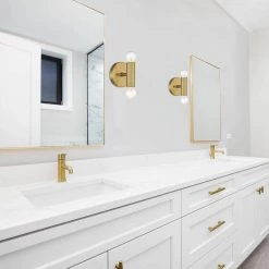 Windrush 2-Light Brushed Gold Wall Sconce by Cordelia Lighting 6 Windrush 2-Light Brushed Gold Wall Sconce by Cordelia Lighting -Spitzer Sales Store brushed gold cordelia lighting vanity lighting 3695 338 31 1000